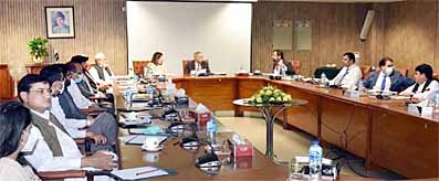 Advisor chairing progress review meeting