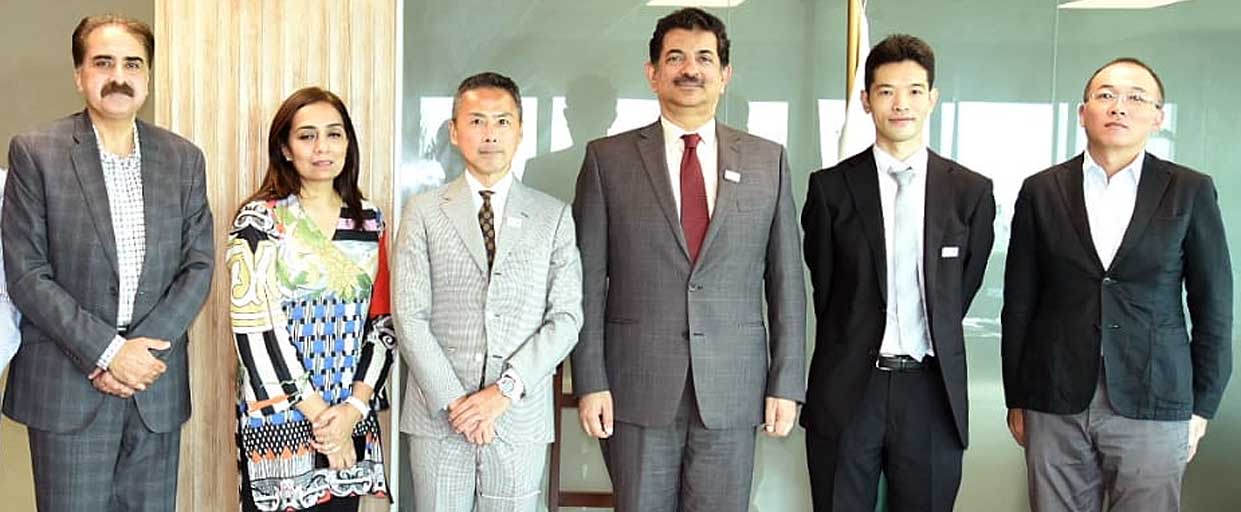 Asad Rehman Gilani with C.D., of JETRO
